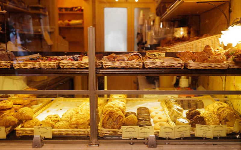 Bakery storefront showcasing varies type of pastries 