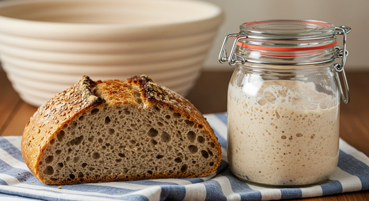 a sourdough starter next to sourdough bread