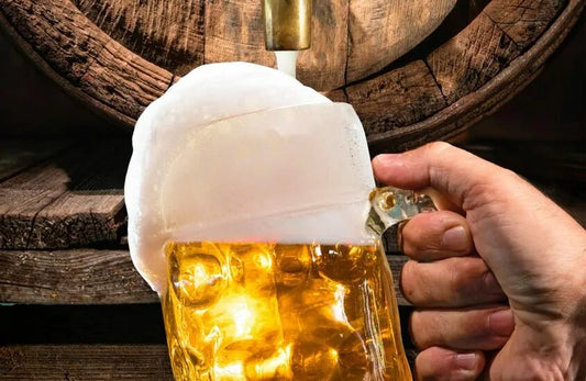 Glass of beer being filled 